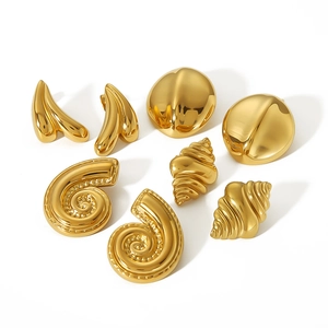 18k gold plated titanium steel croissant and conch shell earrings set on white background