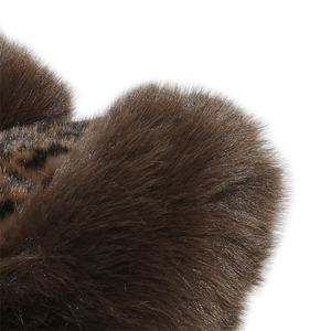 Close-up of fluffy brown faux fur texture and leopard print pattern on winter hat