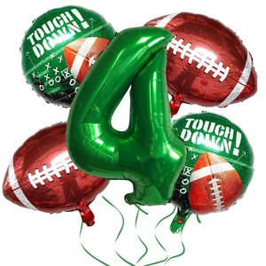 Detail of football party kit with green number 4 balloon and brown football foil balloons