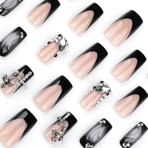 3D French black press-on nails with silver crosses and shimmering water ripple designs
