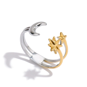Two-tone silver and gold stainless steel open ring with celestial star and moon motifs