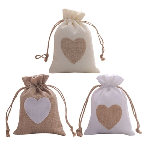 Set of 3 burlap Christmas drawstring gift bags with heart patterns in mixed colors