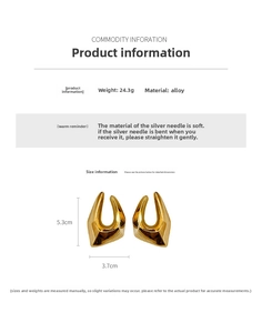Detail view of oversized gold geometric earrings with silver pins and size dimensions