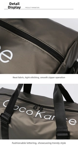 Detail view of smooth matte waterproof fabric and double black metal zippers on duffel bag