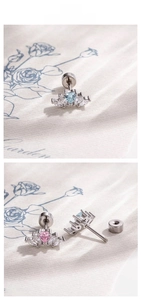 Detailed macro view of heart-shaped zircon stud earrings with secure screw-back design