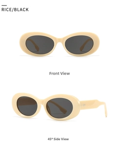 Detail of rice beige oval sunglasses featuring black lenses and stylish metal dot accents