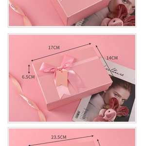 Pink gift box with ribbon and hang tag in 17x14x6.5cm dimensions for birthday gifts