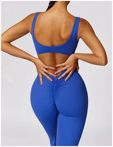 Detail view of royal blue yoga set featuring a racerback top and scrunch butt leggings