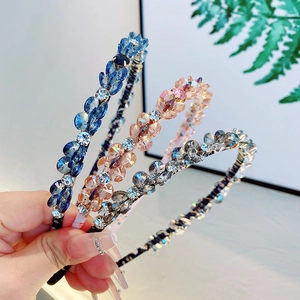 Sparkling crystal headbands in blue, pink, and grey with hand-set rhinestones