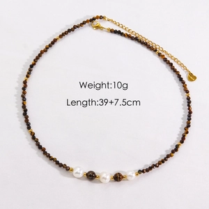 Detail view of tiger eye beads and pearls necklace with 10g weight and length specs
