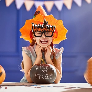 Halloween party glasses with orange lettering and bat motifs for festive costume decoration