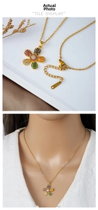 Detailed view of sunflower pendant with multicolor zircon inlay and adjustable gold chain