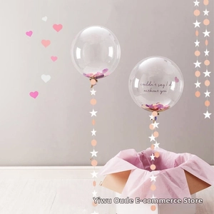 Detail of transparent balloon with confetti and couldn't say I do without you print