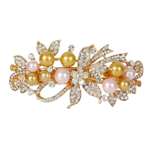 Pince à cheveux dorée élégante avec perles et strass au motif floral sur fond blanc
