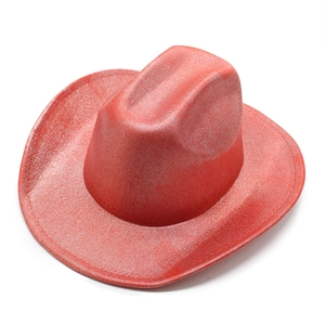 Detail of red glitter cowboy hat with wide brim and shimmering metallic finish for parties