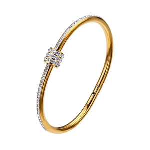 Elegant gold titanium steel bangle with triple rows of zircon stones on white background
