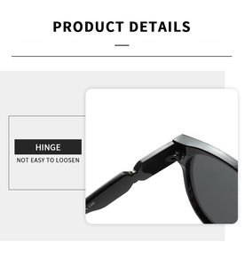 Detail of durable metal hinges on sleek black oval sunglasses with reinforced structure