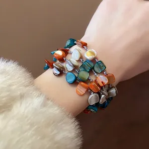 Handmade multilayer shell bracelet with colorful irregular beads in an ethnic style