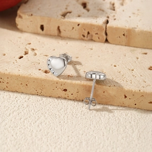 Polished S925 sterling silver heart stud earrings with cubic zirconia on stone base