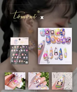 Macro view of 5D embossed nail stickers featuring dream doll and star patterns
