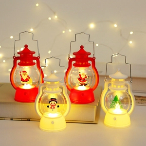 Set of four LED Christmas lanterns featuring Santa and Snowman designs with warm festive glow