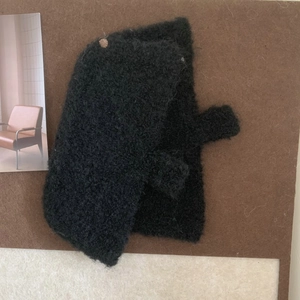 Women's black knit fingerless gloves with soft woolly texture for autumn and winter