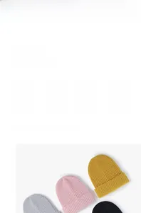 Detail of ribbed knit texture on various colorful thick winter beanies for women