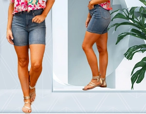 Détail du short en jean taille haute coupe ajustée avec braguette à boutons moderne