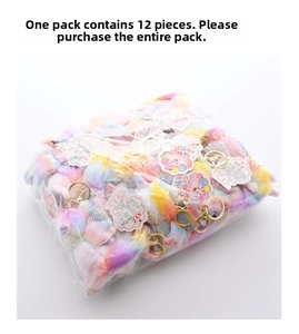 Bulk pack of 12 plush rainbow unicorn keychains with golden rings and soft faux fur