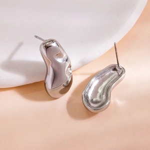 Minimalist organic bean lava earrings in polished silver finish with stud structure