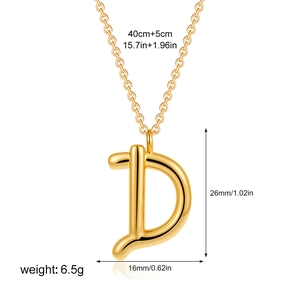 Detail view of 18K gold letter D pendant with dimensions 26x16mm and polished finish