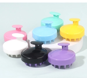 Detailed view of colorful silicone scalp massagers with ergonomic handles and soft bristles
