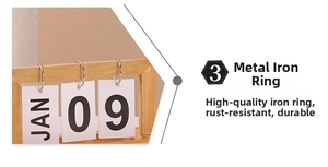 Close-up of wooden flip calendar with metal rings and clear wood grain texture