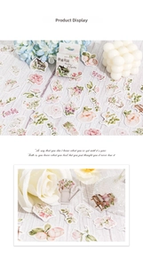 Macro detail of vintage floral stickers and gardening motifs for journal decoration