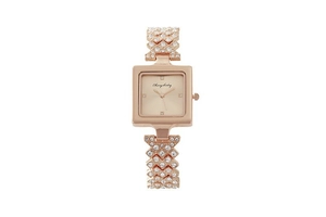Detail view of square rose gold watch dial and luxury rhinestone strap craftsmanship