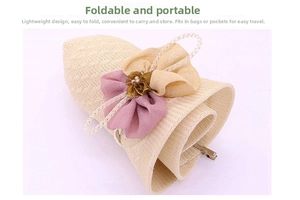 Detail of foldable straw sun hat showing floral decor and portable woven structure