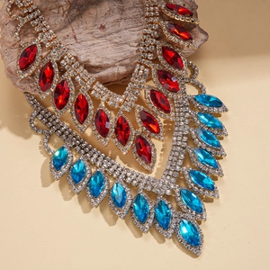 Exquisite teardrop rhinestone fringe necklace and earrings jewelry set on stone
