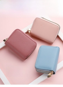 Three multi-functional PU leather card holders in pink, berry, and light blue colors