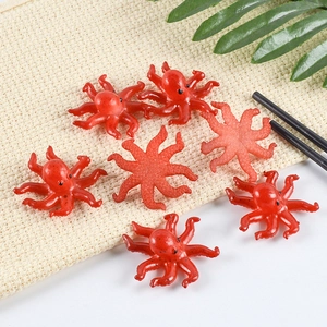 Set of seven realistic red PVC octopus miniatures for DIY crafts and keychains