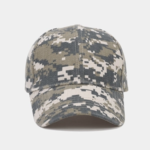 Detail of digital camouflage baseball cap showing heavy-duty canvas texture and curved brim