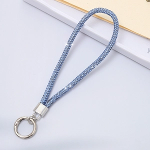 Detail of blue rhinestone lanyard chain with silver metal lobster clasp and key ring