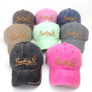 Vintage washed cotton baseball caps with Bourbon St. embroidery in multiple colors