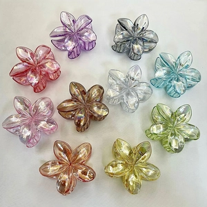 Set of 10 colorful translucent resin plumeria flower hair claws in diverse pastel shades