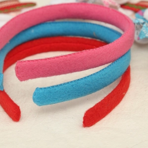 Macro shot showing the colorful soft fabric texture and end finish of Christmas headbands