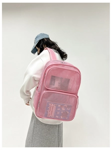 Detail of pink breathable mesh backpack with multi-zipper layers and ergonomic straps