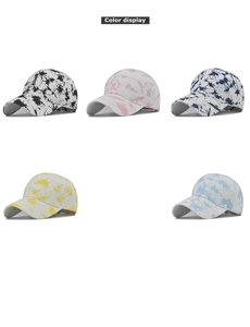 Detail view of cotton tie-dye ponytail sun hats in five vibrant assorted color patterns