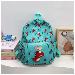 Detail of green toddler backpack featuring red cartoon dinosaur prints and mesh side pockets