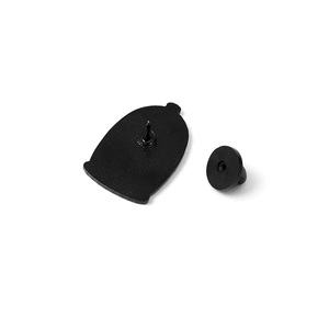 Detail view of the black enamel pin back with a secure rubber clutch fastener