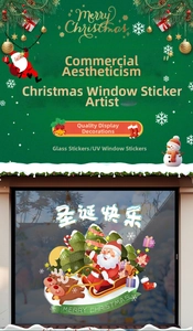 UV window stickers showing Santa in a reindeer sleigh with Merry Christmas text for shops