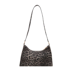 Minimalist leopard print shoulder bag with gold zipper and curved silhouette for women
